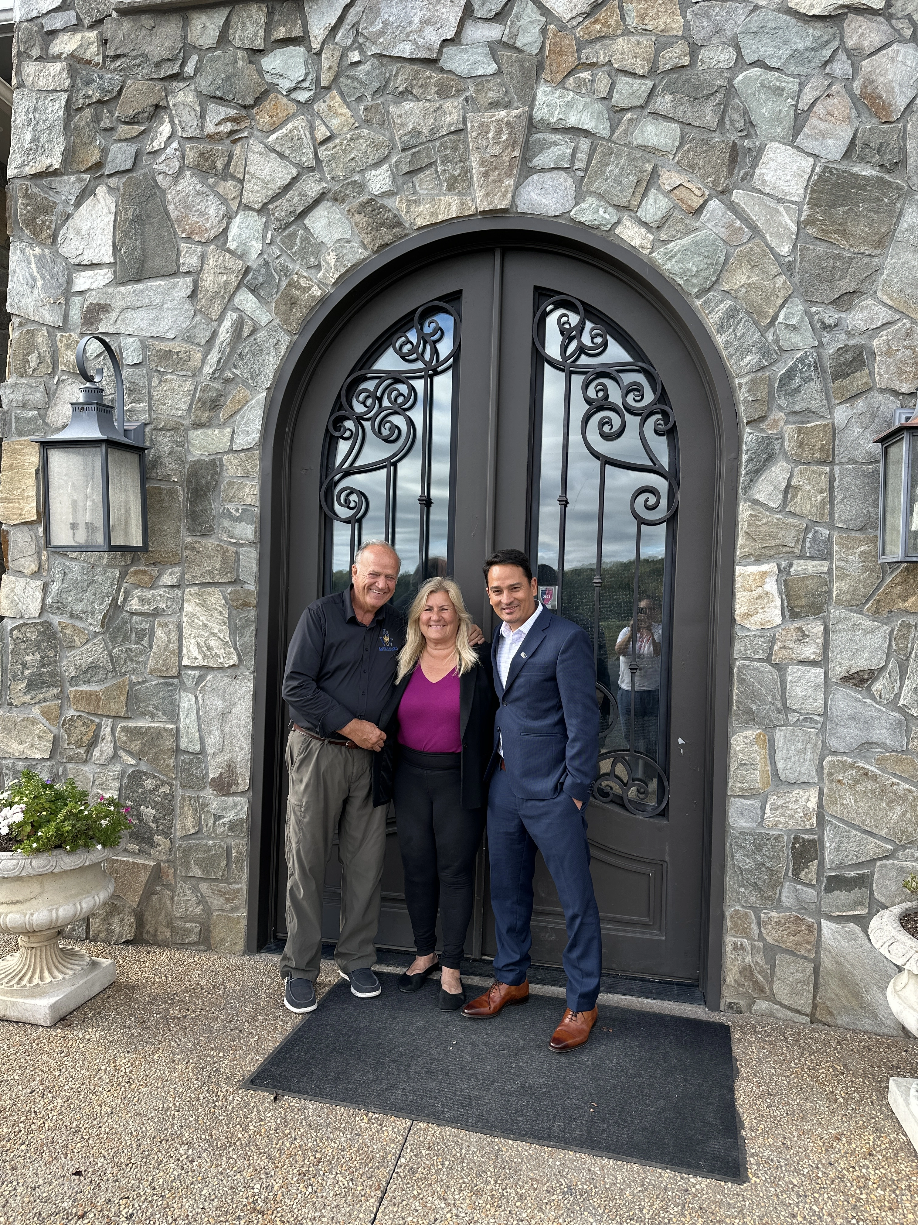 People standing in front of a large door